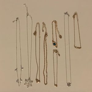 3 necklaces, 2 chokers, and 3 bracelets